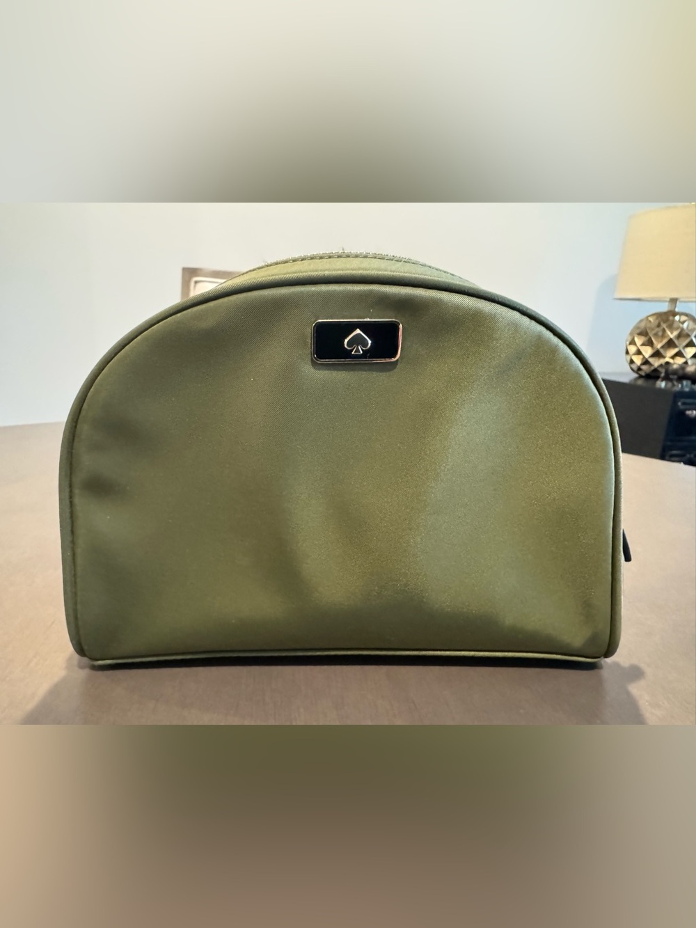 kate spade olive green dome toiletry pouch with spade plaque